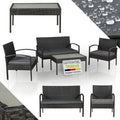 Juskys Trinidad Polyrattan Gartenmöbel Set 4 teilig - Sofa 2 Stühle und Tisch für 4 Personen - Balkon Sitzgruppe mit grauen Kissen - Schwarz